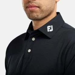 FootJoy Stretch Pique Solid Golf Polo Shirt 12 FootJoy Stretch Pique Solid Golf Polo Shirt -Golf Shirts Sales FOOTJOY PERF SS SHIRT ATH NAVY Model 2