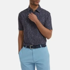 FootJoy Digital Camo FJ Print Lisle Golf Polo Shirt 11 FootJoy Digital Camo FJ Print Lisle Golf Polo Shirt -Golf Shirts Sales FootJoy SS22 Digital Camo FJ Print Lisle Golf Polo Shirt Navy 88436 model 1