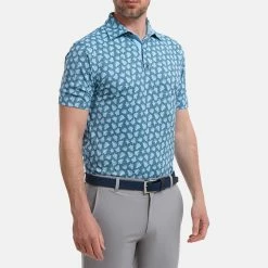 FootJoy Shadow Palm Print Pique Golf Polo Shirt 11 FootJoy Shadow Palm Print Pique Golf Polo Shirt -Golf Shirts Sales FootJoy SS22 Shadow Palm Print Pique Golf Polo Shirt Ink Dusk Blue 88375 model 1