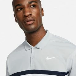 Nike Dry Victory Colourblock Golf Polo Shirt 12 Nike Dry Victory Colourblock Golf Polo Shirt -Golf Shirts Sales Nike SS22 Dry Victory Colourblock Golf Polo Shirt DH0845 077 M Smoke Grey Obsidian White model 2
