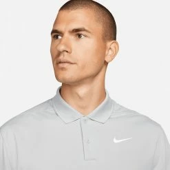Nike Dry Victory Solid Long Sleeve Golf Polo Shirt 12 Nike Dry Victory Solid Long Sleeve Golf Polo Shirt -Golf Shirts Sales Nike Golf AW22 Dri Fit Victory Solid Long Sleeve Shirt DN2344 077 SHNIK818 Light Smoke Grey White Model 2