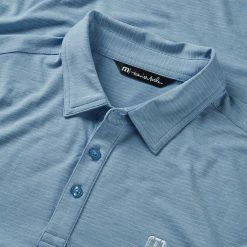 TravisMathew The Heater Golf Polo Shirt Black 9 TravisMathew The Heater Golf Polo Shirt Black -Golf Shirts Sales Travis Mathew SS21 The Heater Golf Polo Shirt 1MW395 Code SHTRA040 M Heather Heritage Blue Detail