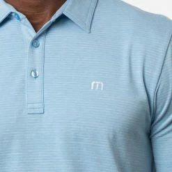 TravisMathew The Heater Golf Polo Shirt Black 12 TravisMathew The Heater Golf Polo Shirt Black -Golf Shirts Sales Travis Mathew SS21 The Heater Golf Polo Shirt 1MW395 Code SHTRA040 M Heather Heritage Blue Model 2