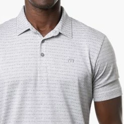 TravisMathew Time Will Tell Golf Polo Shirt 12 TravisMathew Time Will Tell Golf Polo Shirt -Golf Shirts Sales Travis Mathew SS21 Time Will Tell Golf Polo Shirt 1MW105 Code SHTRA041 Heather Light Grey Model 2