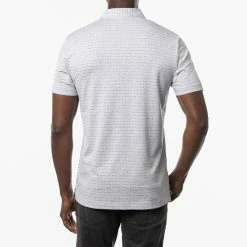 TravisMathew Time Will Tell Golf Polo Shirt 13 TravisMathew Time Will Tell Golf Polo Shirt -Golf Shirts Sales Travis Mathew SS21 Time Will Tell Golf Polo Shirt 1MW105 Code SHTRA041 Heather Light Grey Model 3